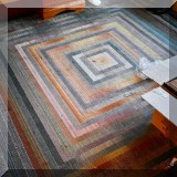 D20.  Multicolored rug. 7'9&rdquo; x 7'9&rdquo; 